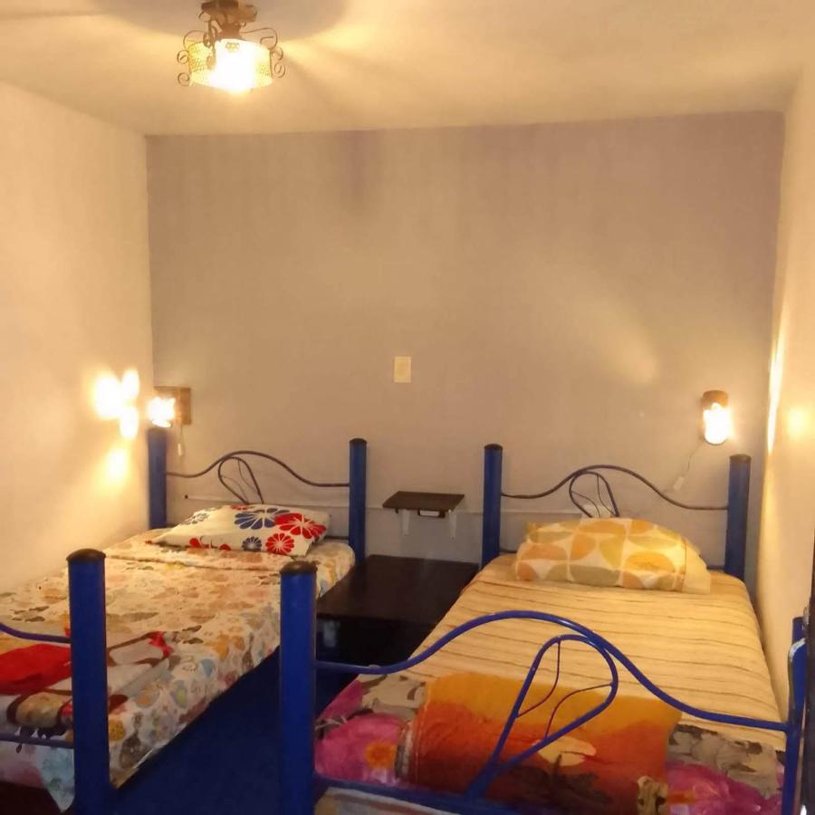 Hostal Musica Y Arte San Augustin Bagian luar foto